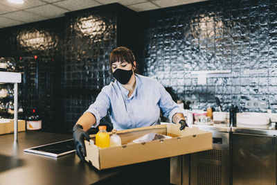 Portrait of man working at table