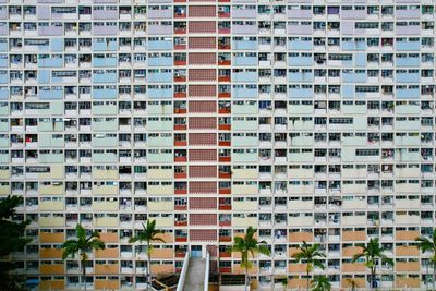 Full frame shot of the famous residential building with rainbow colour in hong kong