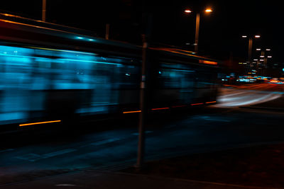 Blurred motion of bus at night