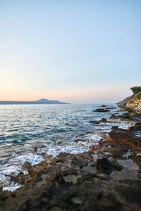 Scenic view of sea against sky during sunset