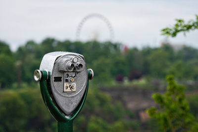 Tourist binoculars at american side of niagara falls, new york, usa