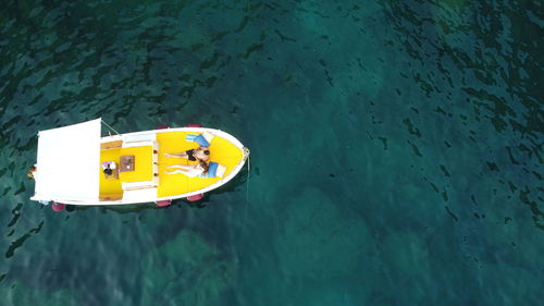 High angle view of yellow floating on water