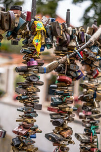 Close-up of love padlocks tied up of railing