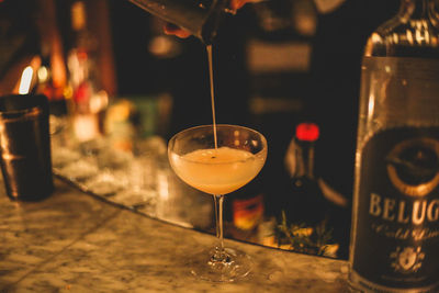 Close-up of wineglass on table