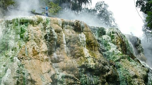 Low angle view of rock formations