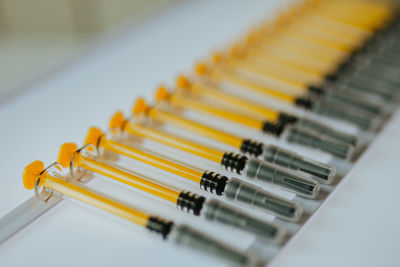 High angle view of syringes