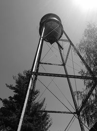 Low angle view of communications tower against sky