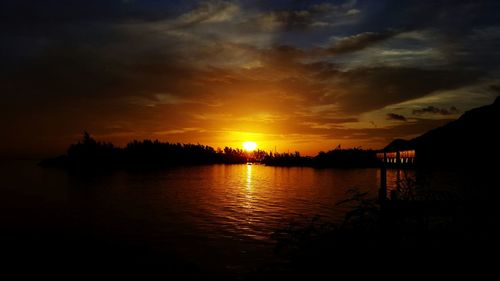 Scenic view of sunset over river