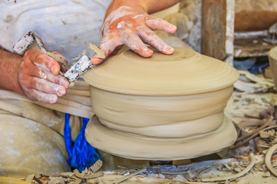 Cropped image of man working at workshop