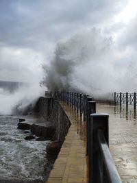 Very rough sea, wave against the pier
