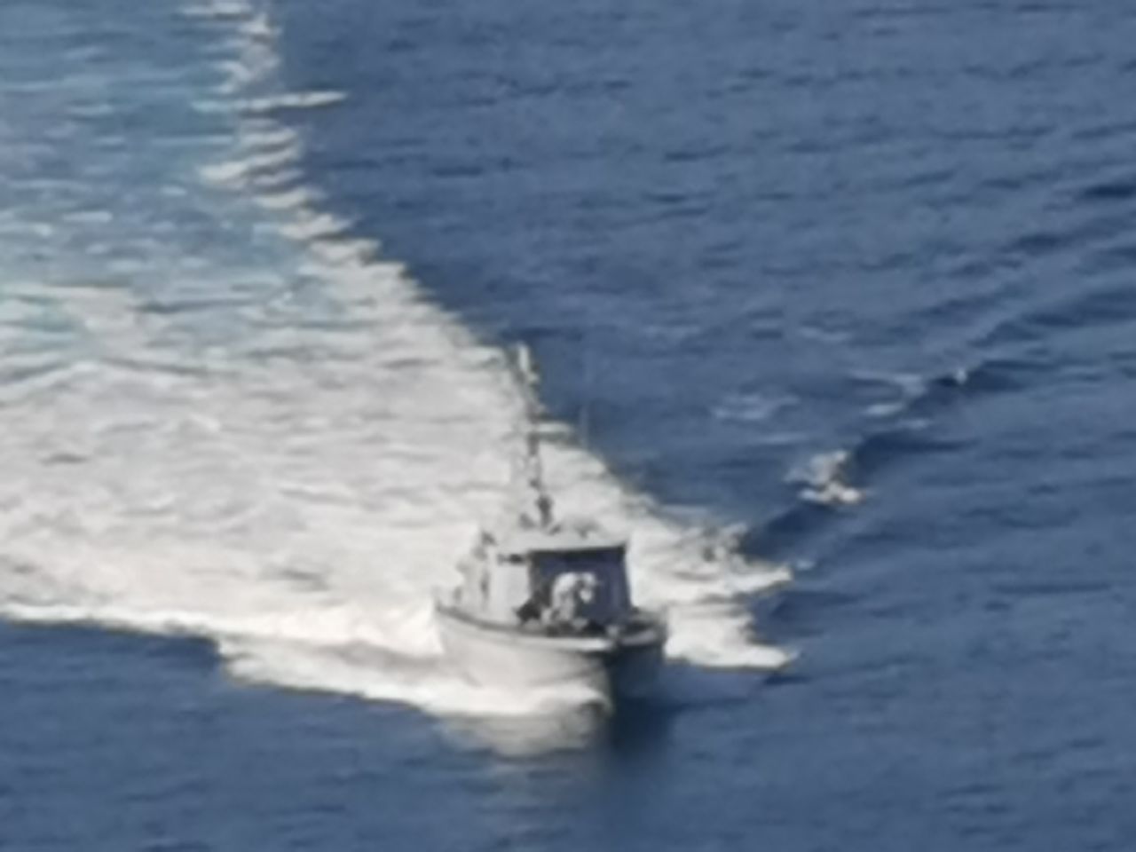 HIGH ANGLE VIEW OF SHIP SAILING ON SEA