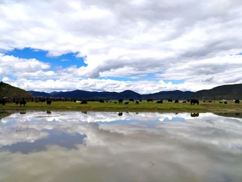 Scenic view of lake against sky