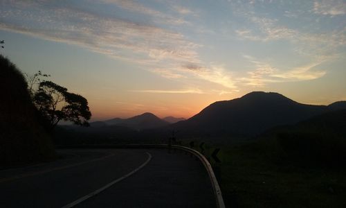 Scenic view of mountains against sky during sunset