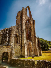 Low angle view of old building against sky