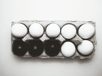High angle view of candies against white background
