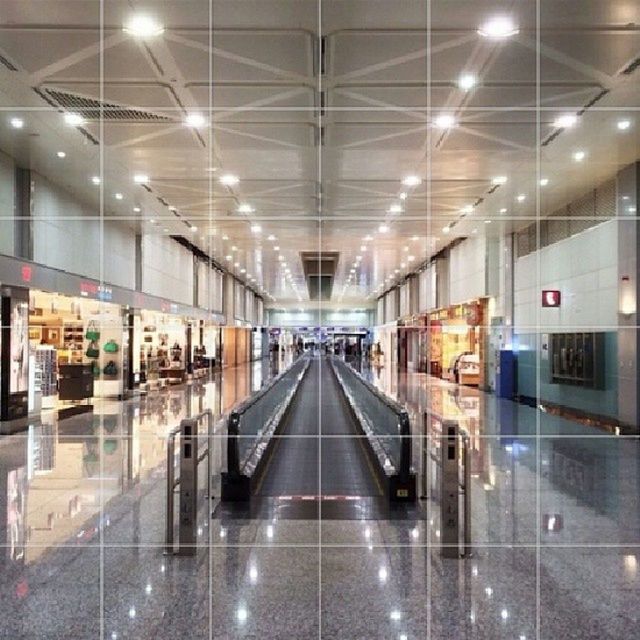 indoors, transportation, illuminated, ceiling, railroad station platform, railroad station, public transportation, rail transportation, subway station, the way forward, diminishing perspective, subway, architecture, built structure, railroad track, lighting equipment, empty, incidental people, interior, transportation building - type of building