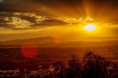 Scenic view of sunset over landscape