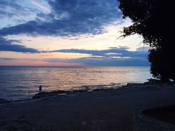 Scenic view of sea at sunset