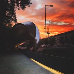 Street against sky during sunset
