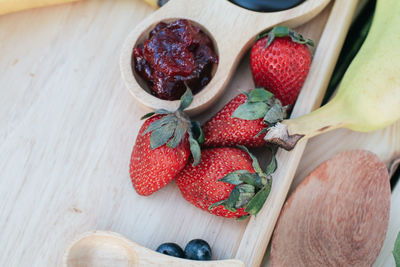 High angle view of strawberries on table