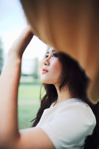 Close-up of woman looking away