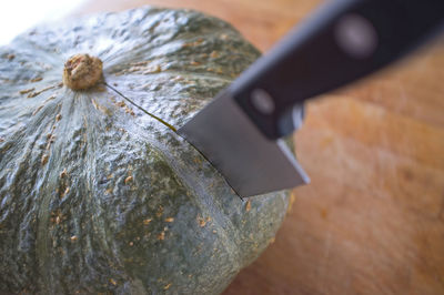 Knife inserted in a pumpkin