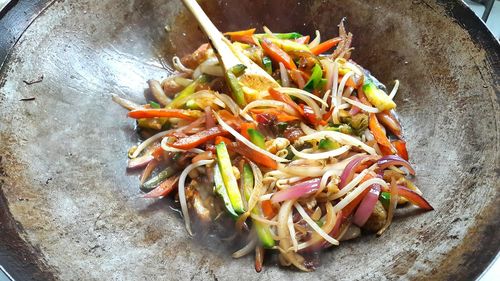 Close-up of wok with grilled vegetables 