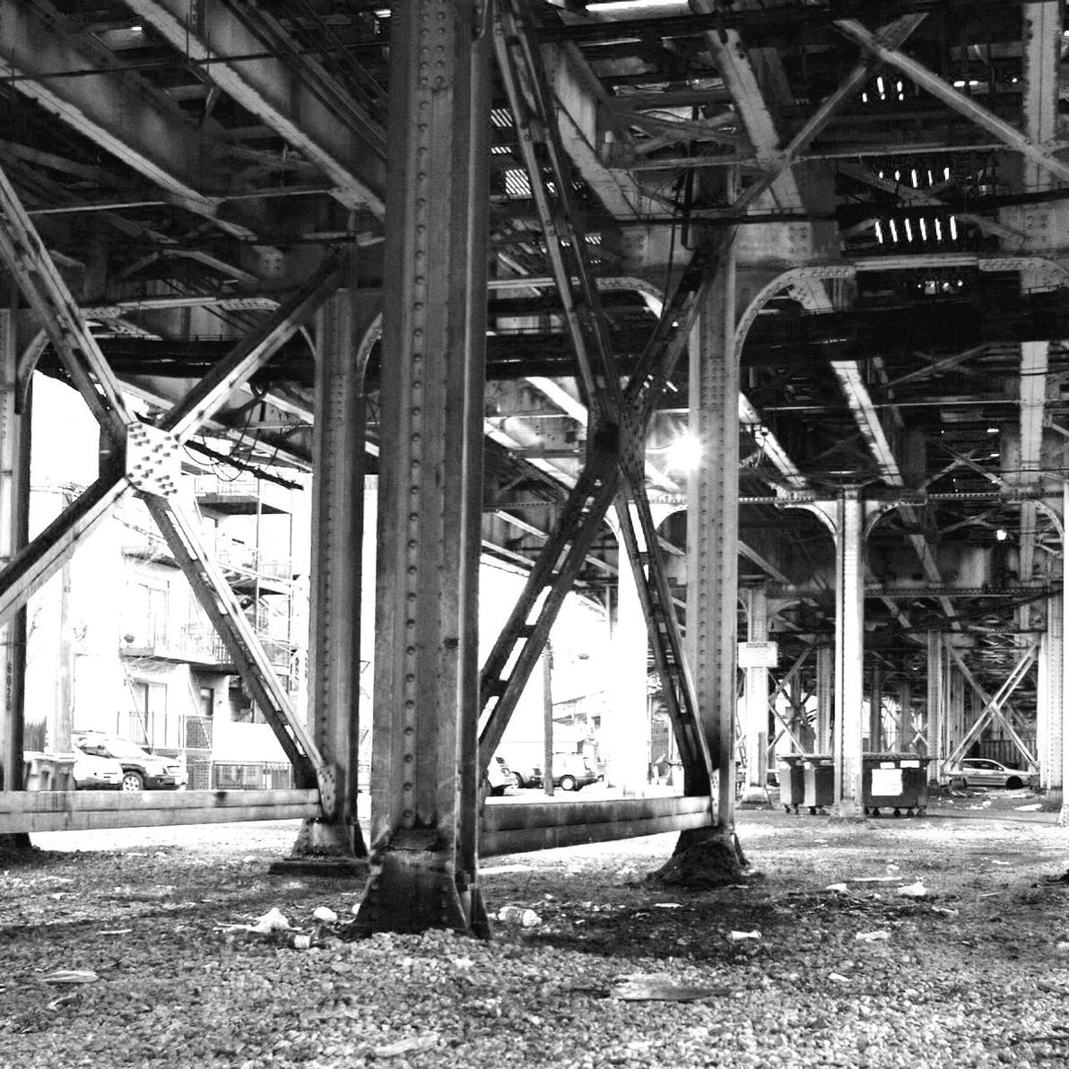 built structure, architecture, metal, transportation, connection, metallic, bridge - man made structure, industry, engineering, day, outdoors, no people, construction site, sky, sunlight, the way forward, empty, abandoned, factory, low angle view