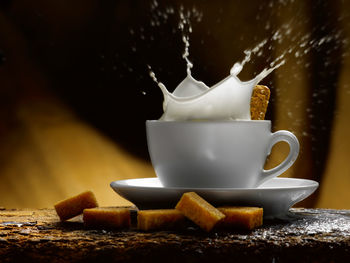 Close-up of coffee cup on table