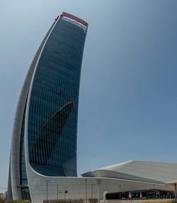 Low angle view of modern building against clear sky