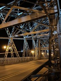 View of illuminated bridge at night