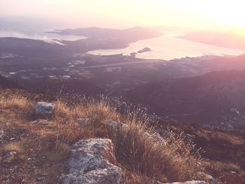 Aerial view of landscape against sky during sunset