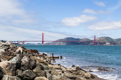 View of suspension bridge over sea