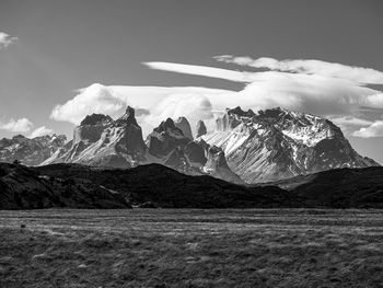 Scenic view of snowcapped mountains against sky