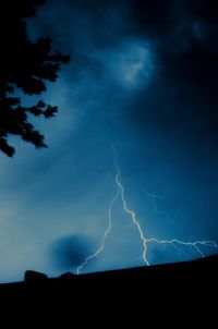 Low angle view of vapor trails in sky