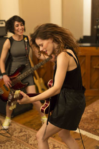 Young musicians practicing at a rehearsal space