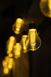 Close-up of illuminated light bulb