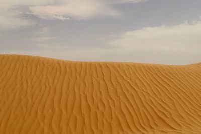 Scenic view of desert against sky