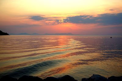 Scenic view of sea at sunset