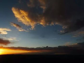 Scenic view of landscape at sunset