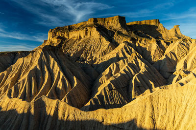 Scenic view of rocky mountains against sky