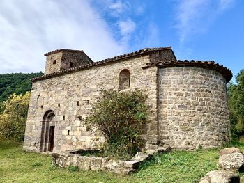 Low angle view of old building against sky