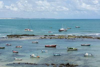 High angle view of sailboat in sea against sky