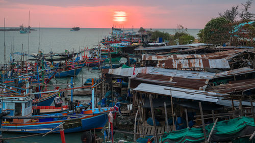 Cha-am fisherman dock at sunrise by top view, phetchaburi, thailand. fishing port and local village
