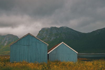 Built structure on land by buildings against sky