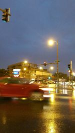 Illuminated street light at night