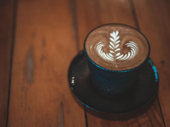 Coffee cup on table