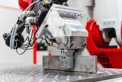 Close-up of automatic industrial welding robot in factory