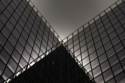 Low angle view of skyscraper against clear sky