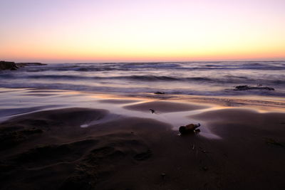 Scenic view of beach during sunset